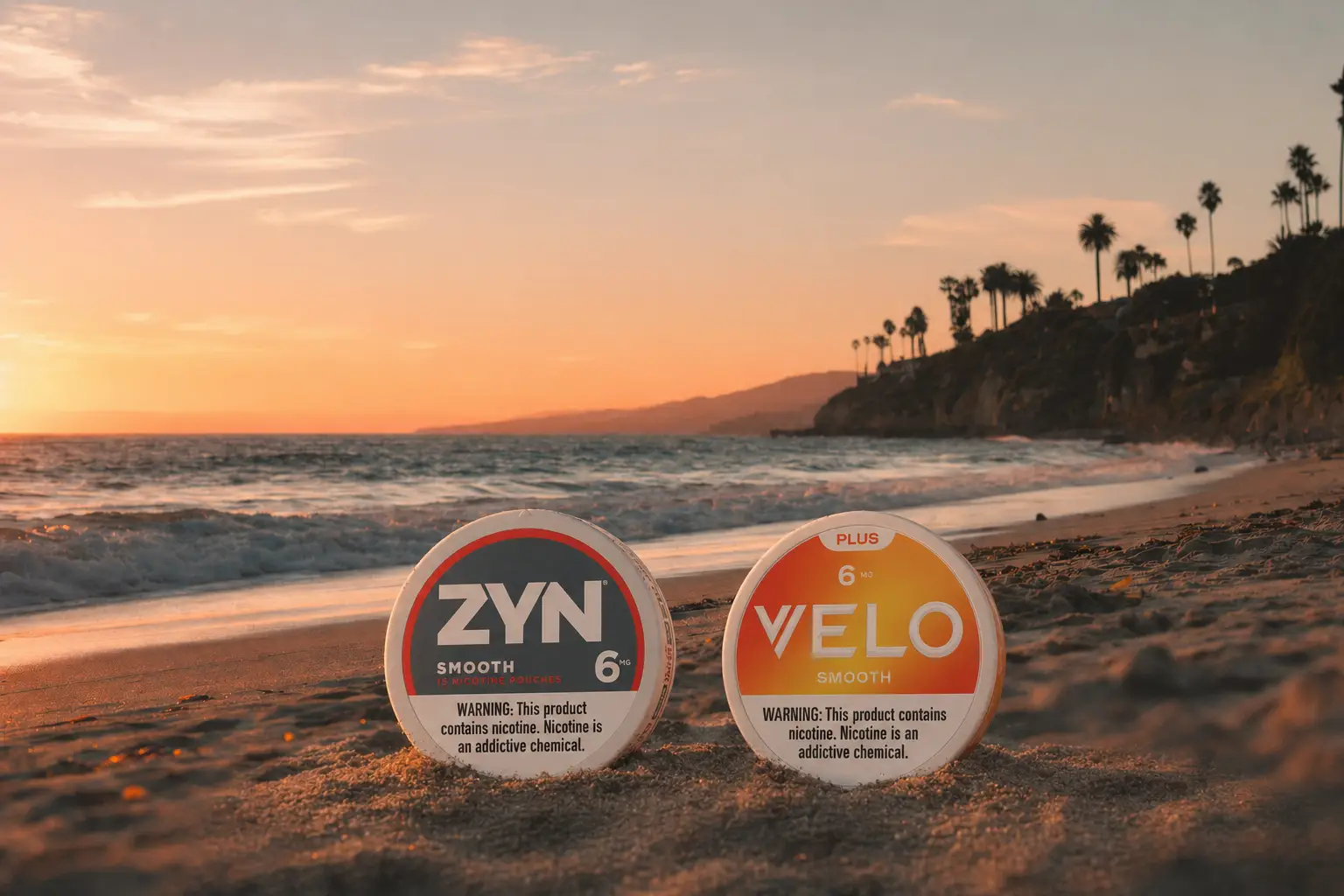 ZYN and Velo nicotine pouch tins resting on a California beach at golden hour